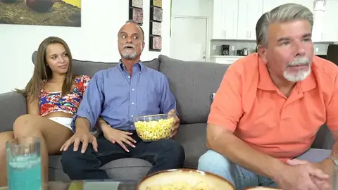 Nubile taunts astonished daddy's mate by pawing his man sausage