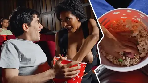 Public bi-racial in the cinema with an dark-hued