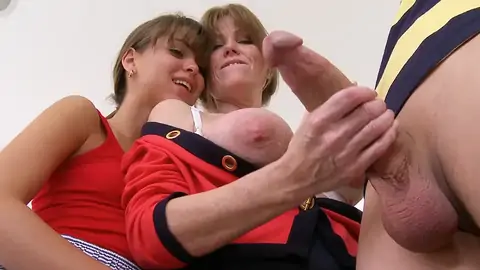 Youthfull boy gets a hj from a MILF before the FFM